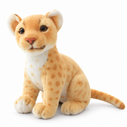 Pale golden big cat cub plush sitting on a white background
