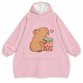 Pink capybara blanket hoodie with a bubble tea print on a white background