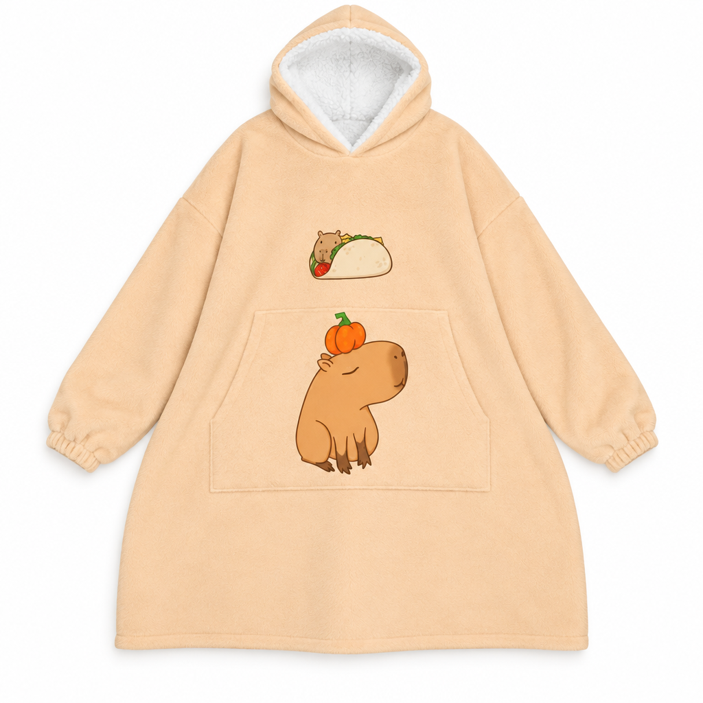 Peach capybara blanket hoodie with a tangerine print on a white background