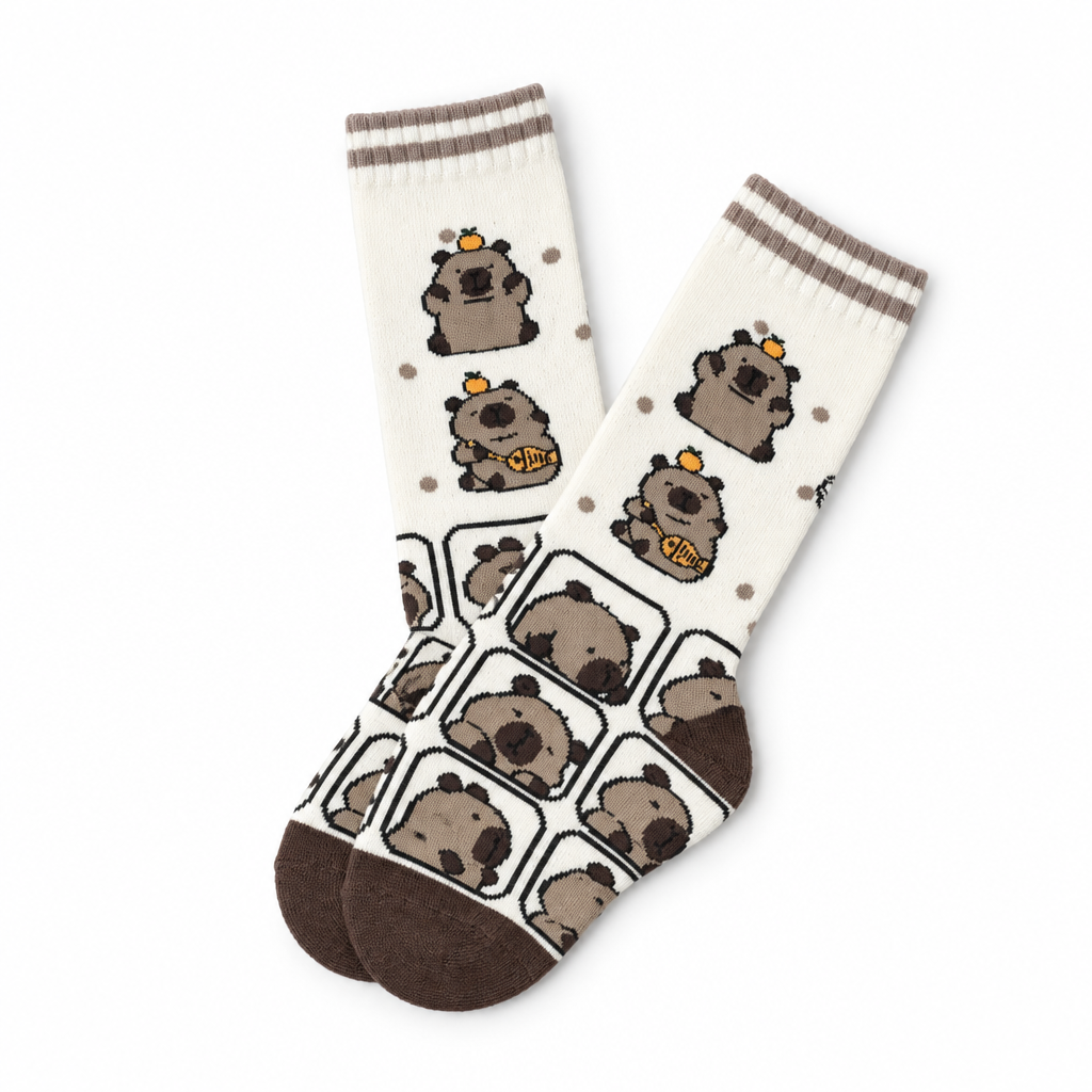 Cream crew socks with a capybara print on a white background