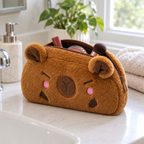 Capybara pouch used as a makeup bag on a bathroom vanity