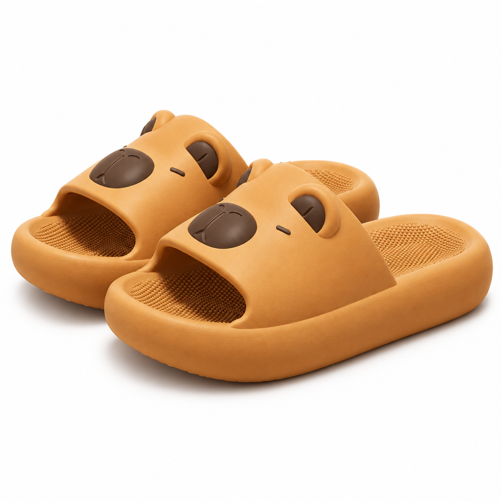 Caramel capybara face slide sandals on a white background