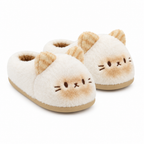 Cream cat slippers with caramel ears and face on a white background
