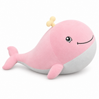 Chubby pink whale plush with a little yellow spout on a white background