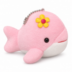 Pink plush dolphin keychain with a yellow flower on a white background
