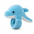 Sky blue plush dolphin slap bracelet on a white background