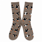 Taupe crew socks patterned with ducks in flight on a white background