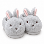 Gray fluffy bunny slippers with pink-lined ears on a white background