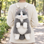 Adult wearing the gray fluffy cat backpack on a park path