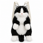 Black and white tuxedo cat plush backpack on a white background