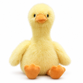 Fluffy yellow duck plush on a white background