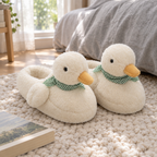 Pair of white duck slippers with gingham scarves on a knit rug beside a bed