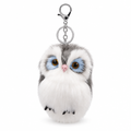 Gray and white fluffy owl keychain with a silver clasp on a white background