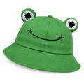 Green frog bucket hat with padded eyes and an embroidered smile on a white background