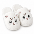 White fuzzy cat face slippers on a white background