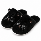 Black fuzzy cat face slippers on a white background