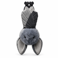 Gray bat plush hanging upside down wrapped in its wings on a white background