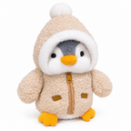 Penguin plush in a beige fuzzy hooded jacket on a white background