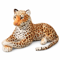 Lifelike spotted jaguar plush lying down on a white background