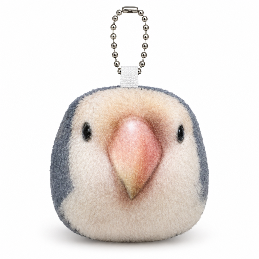 White lovebird plush bird head keychain with a peach-pink beak on a white background