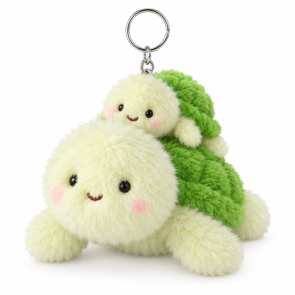Green mom and baby sea turtle plush keychain on a white background