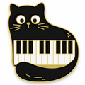 Black cat enamel pin with piano keys on its belly on a white background