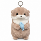 Taupe otter plush keychain hugging a blue fish on a white background