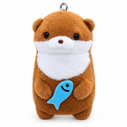 Brown otter plush keychain hugging a blue fish on a white background
