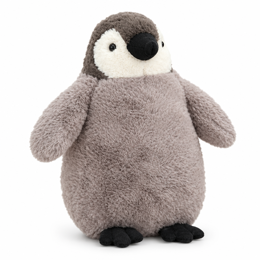 Fluffy gray penguin chick plush on a white background