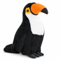 Black toucan plush with a white chest and orange beak on a white background