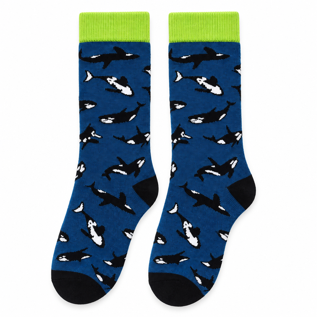 Denim blue crew socks with orcas and a lime green cuff on a white background