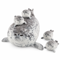 Spotted gray seal mom plush with four small seal pups on a white background