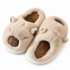 Beige capybara plush slippers on a white background