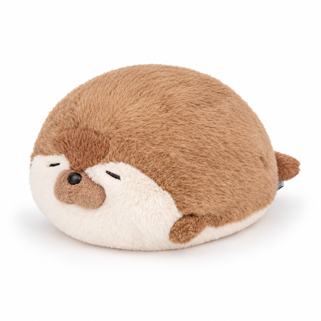 Round brown otter plush pillow with sleepy eyes on a white background