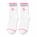 White socks with pink and blue striped cuffs and an embroidered flamingo on a white background