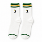 White socks with green and yellow striped cuffs and an embroidered penguin on a white background