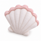 Cream and pink scallop shell plush on a white background