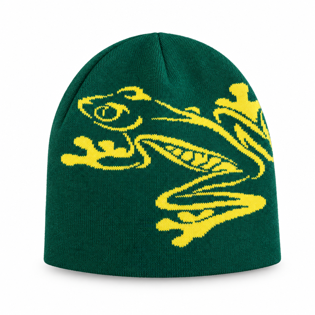 Forest green knit beanie with a yellow tree frog design on a white background