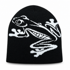 Black knit beanie with a white tree frog design on a white background