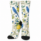 Off-white crew socks printed with blue birds and lemons on a white background