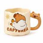 Wavy cream ceramic mug with a capybara lying on a white duck, on a white background
