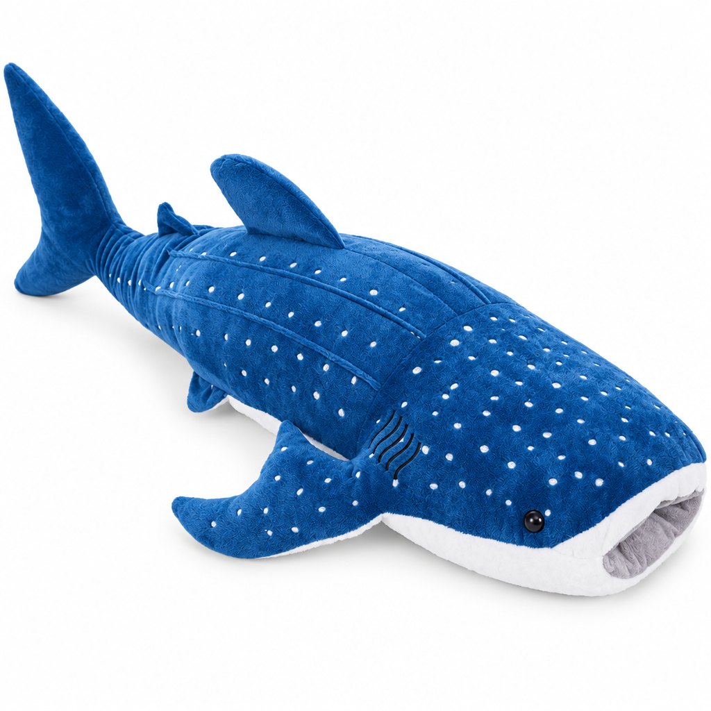 Blue spotted whale shark plush on a white background